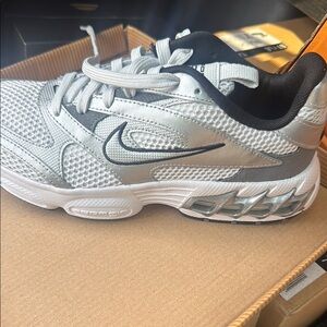 Nike Women's Silver and Black Sneakers